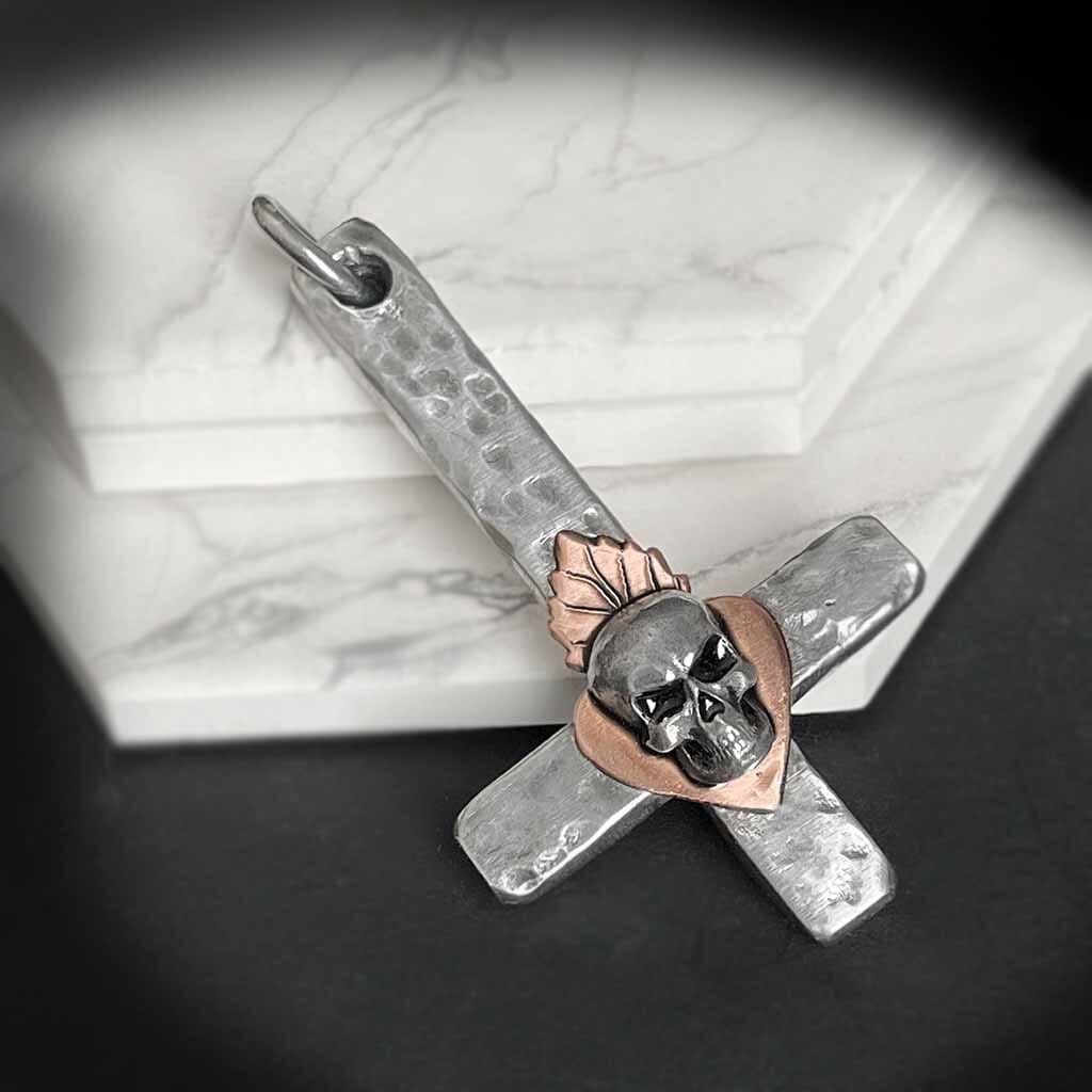 Rock Out in Style. Inverted Skull Cross Pendant Makes a Powerful Statement