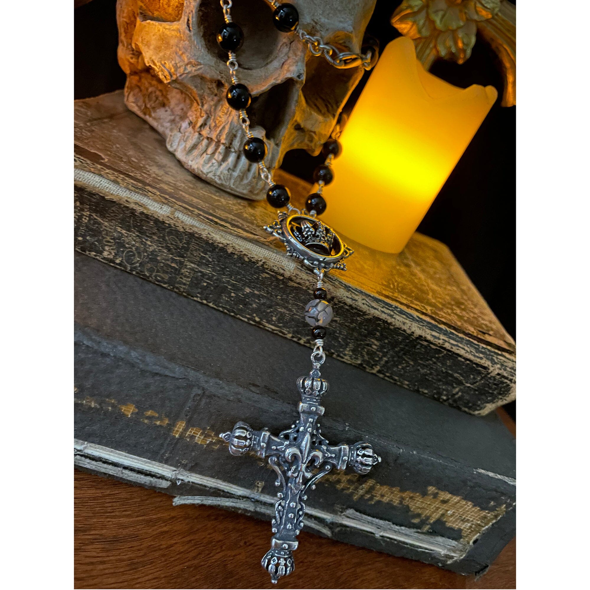 Bold Rosary Necklace with Fleur-de-lis cross pendant and onyx beads. Rock My Wings
