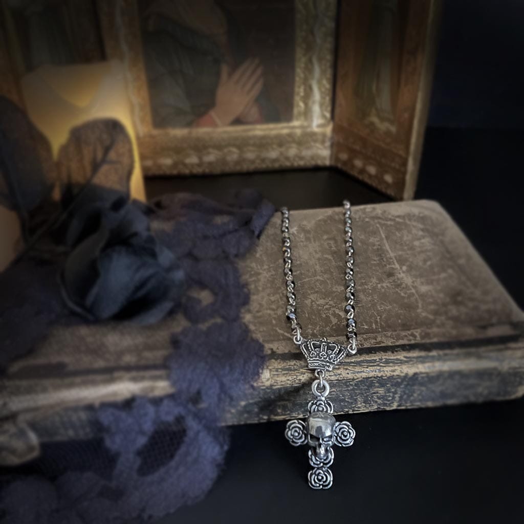 close up view of the skull and rose short rosary necklace by rock my wings