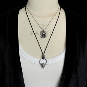 Spinning Skull and Hammered Ring Pendant